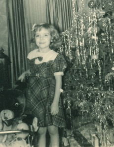 Here I am with the Christmas tree at age 7